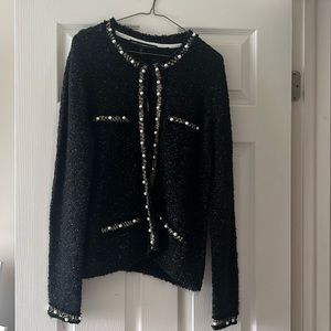 Black, button up sweater with pearl buttons and accents. NWT.